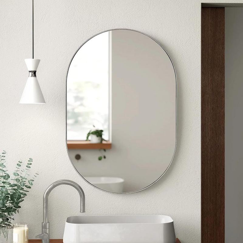 Nestfair - 20 in. W x 28 in. H Silver Oval Brush Metal Framed Vanity Mirror